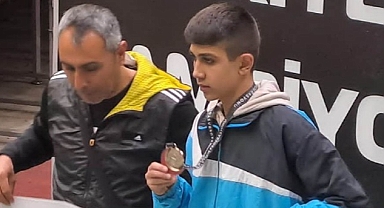 Depremzede atlet artık Nilüfer Belediyespor için koşacak