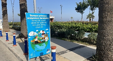 Temiz bir çevre için yere atma, çöpe at