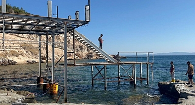 Ayıbalığı Koyu'ndaki izinsiz iskelenin sökümü başladı