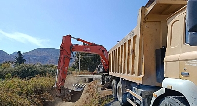 Ekipler yağmura karşı sahada